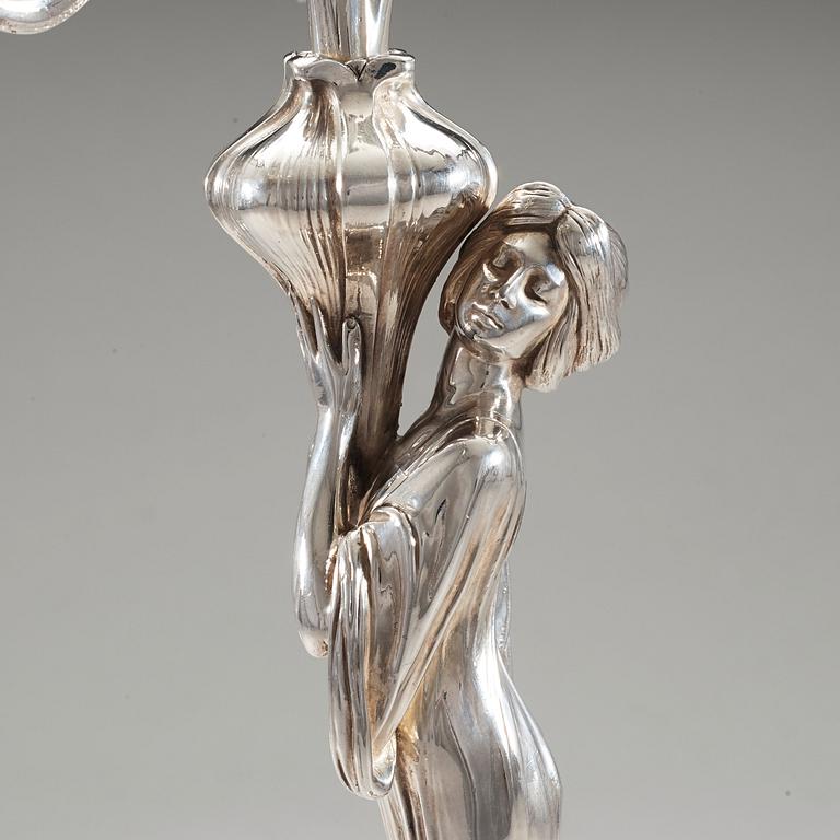 A pair of Art Nouveau silver plated four-light candelabra by Würtenbergische Metallwaren Fabrik (WMF), Germany.