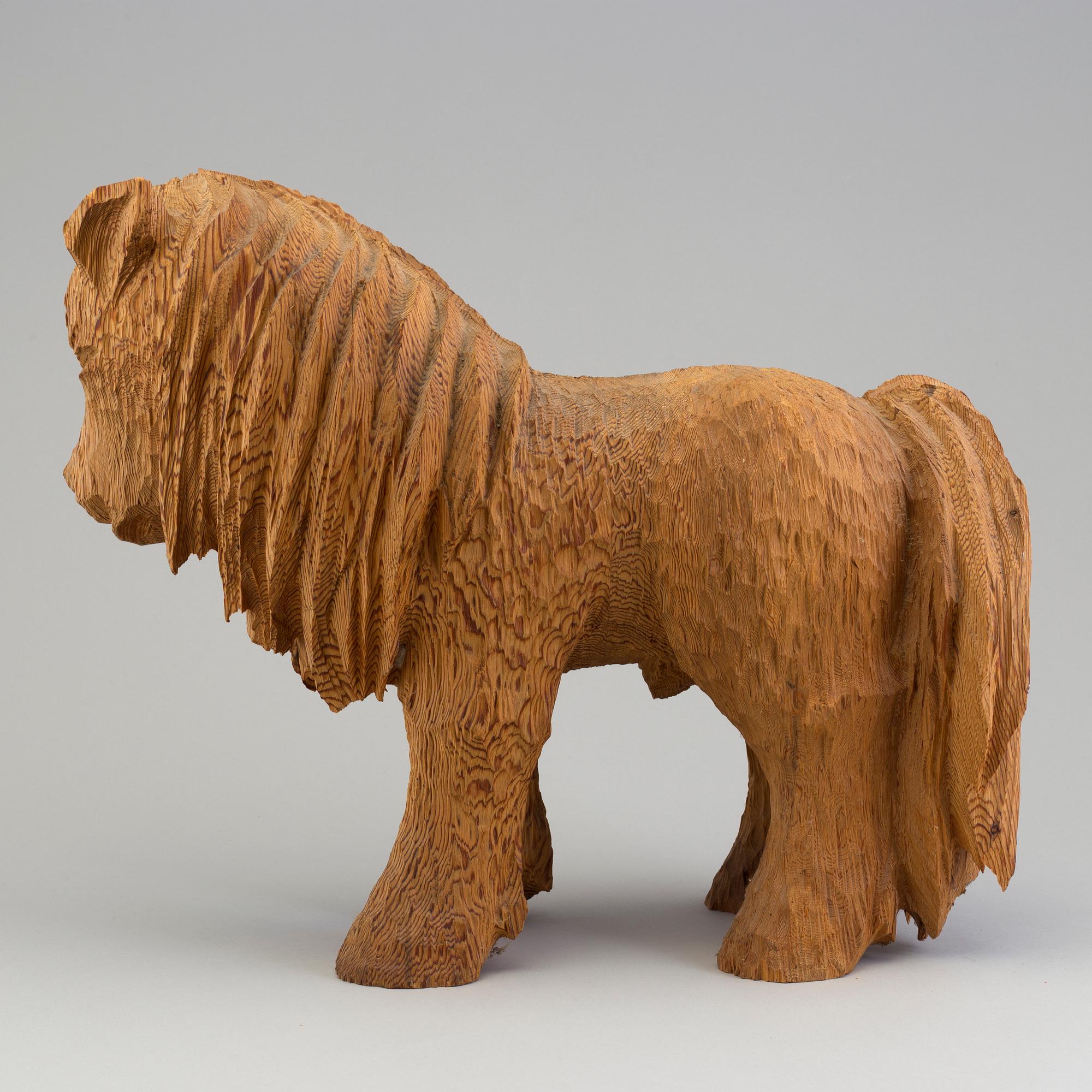 OKÄND KONSTNÄR, skulptur, trä, troligen Gertrud Hagberg, daterad 1971.