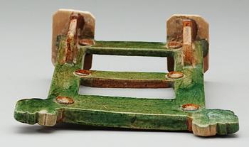 A green and brown glazed pottery stand/gate, Ming dynasty (1368-1644).