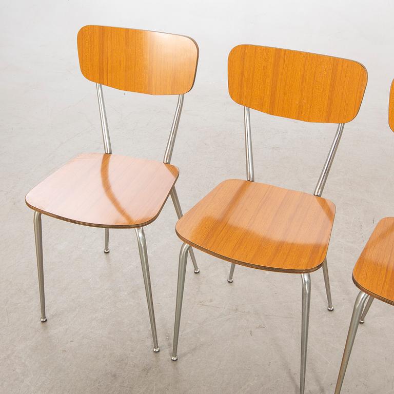 A Salvazini table and four chairs Italy 1950s.