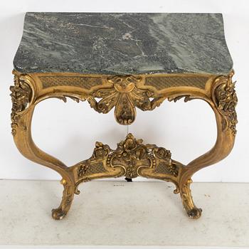 Mirror with console table, Rococo style, circa 1900.