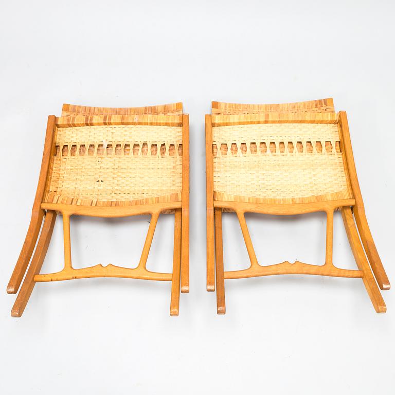 HANS J WEGNER, A pair of JH-512 folding chairs for Johannes Hansen, Denmark, early 1980s. Model designed in 1949.