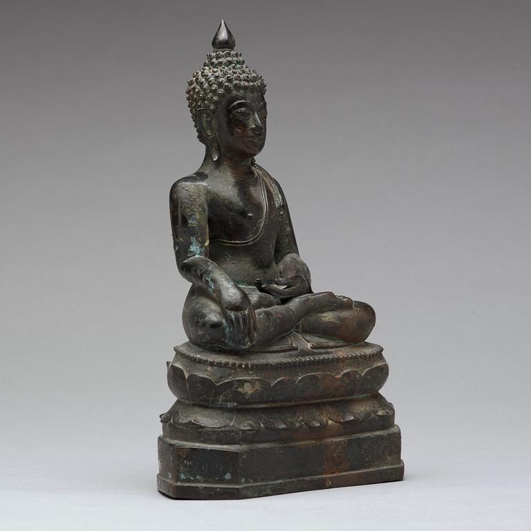 A bronze sculpture of a seated buddha, Thailand, presumably Lanna, 18th Century.