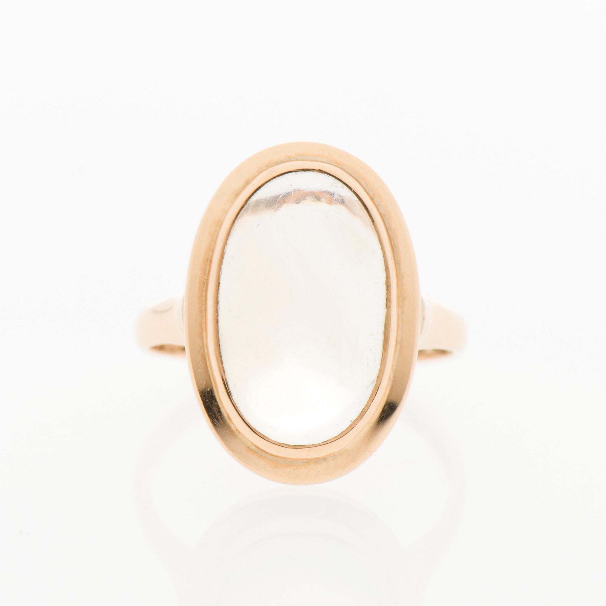 SORMUS, pyöröhiottu kuukivi, kultaa. Korutuote, Heinola Finland 1958.