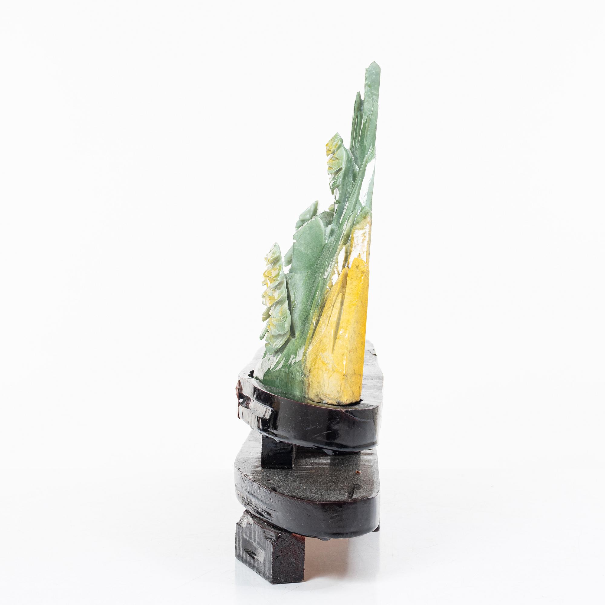 A serpentine jade csulptural carving, China, modern manufacturing.