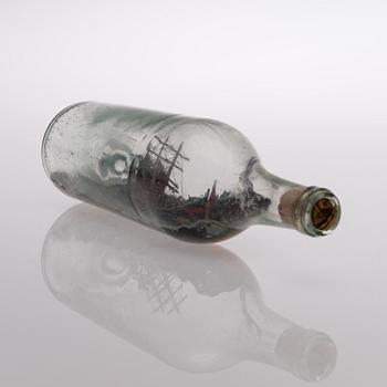 A Swedish compass by G.W. Lyth in Stockholm, and a bottle ship.