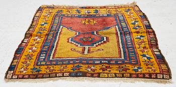 An antique prayer rug, central Anatolia, c.. 92 x 77 cm.