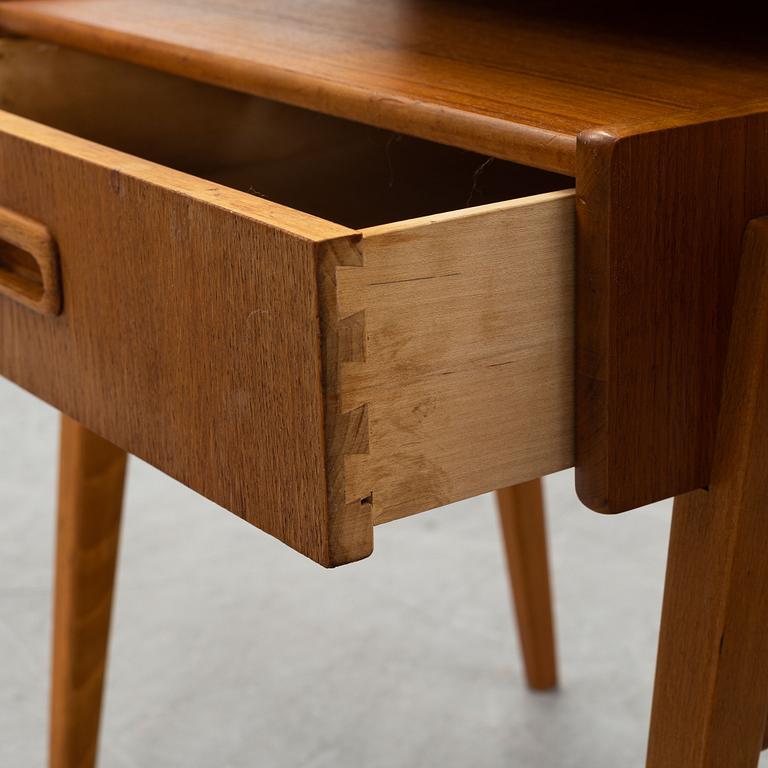A pair of 1950's/60's bedside tables.