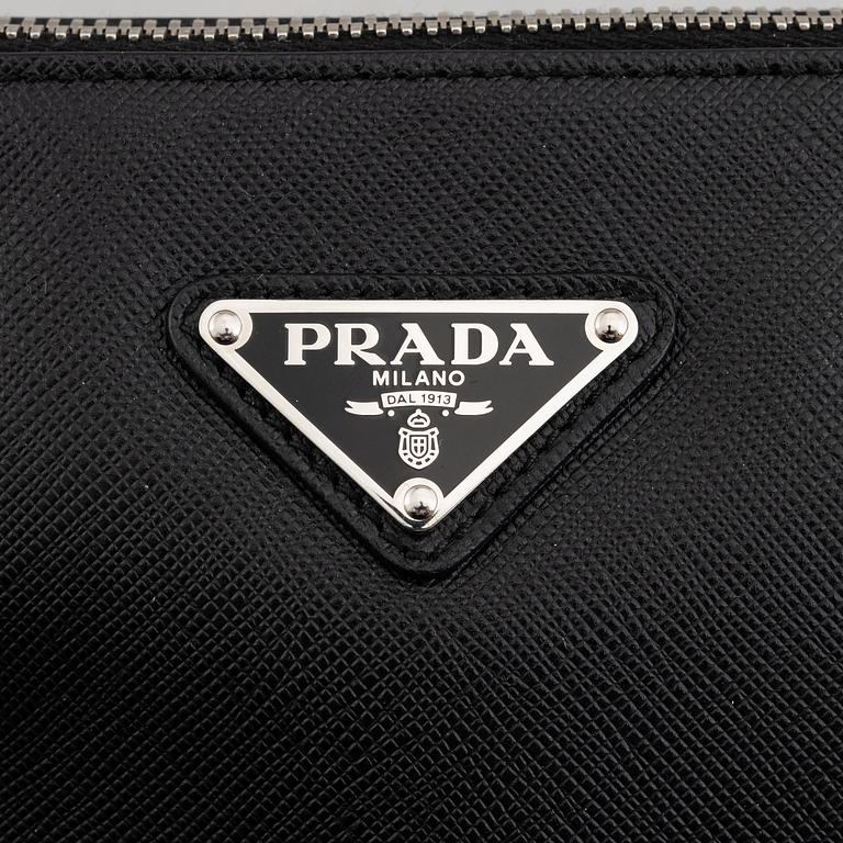 Prada, clutch.