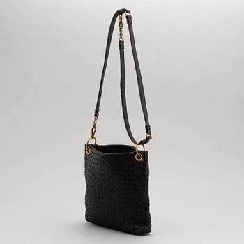 Bottega Veneta, a black intrecciato handbag.