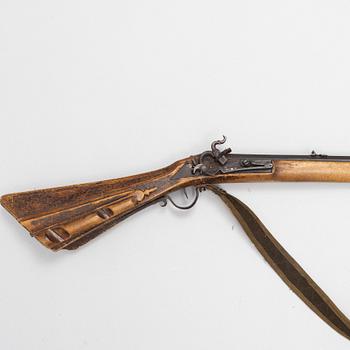 A Percussion rifle, 19th century.