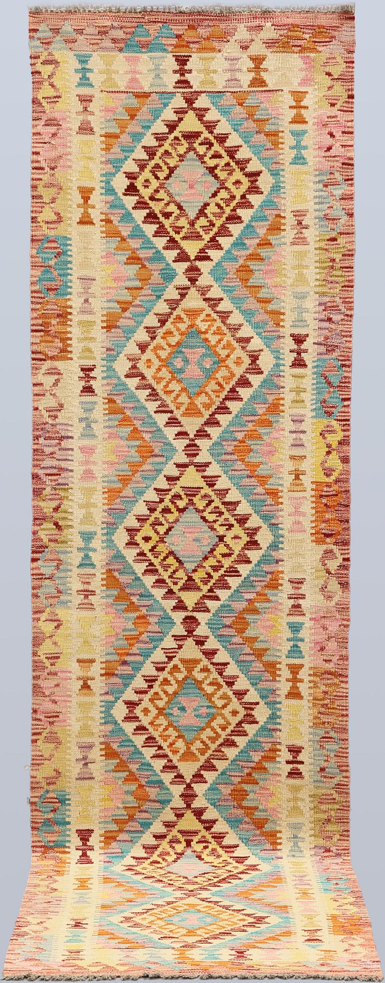 A Kilim runner, c. 293 x 78 cm.
