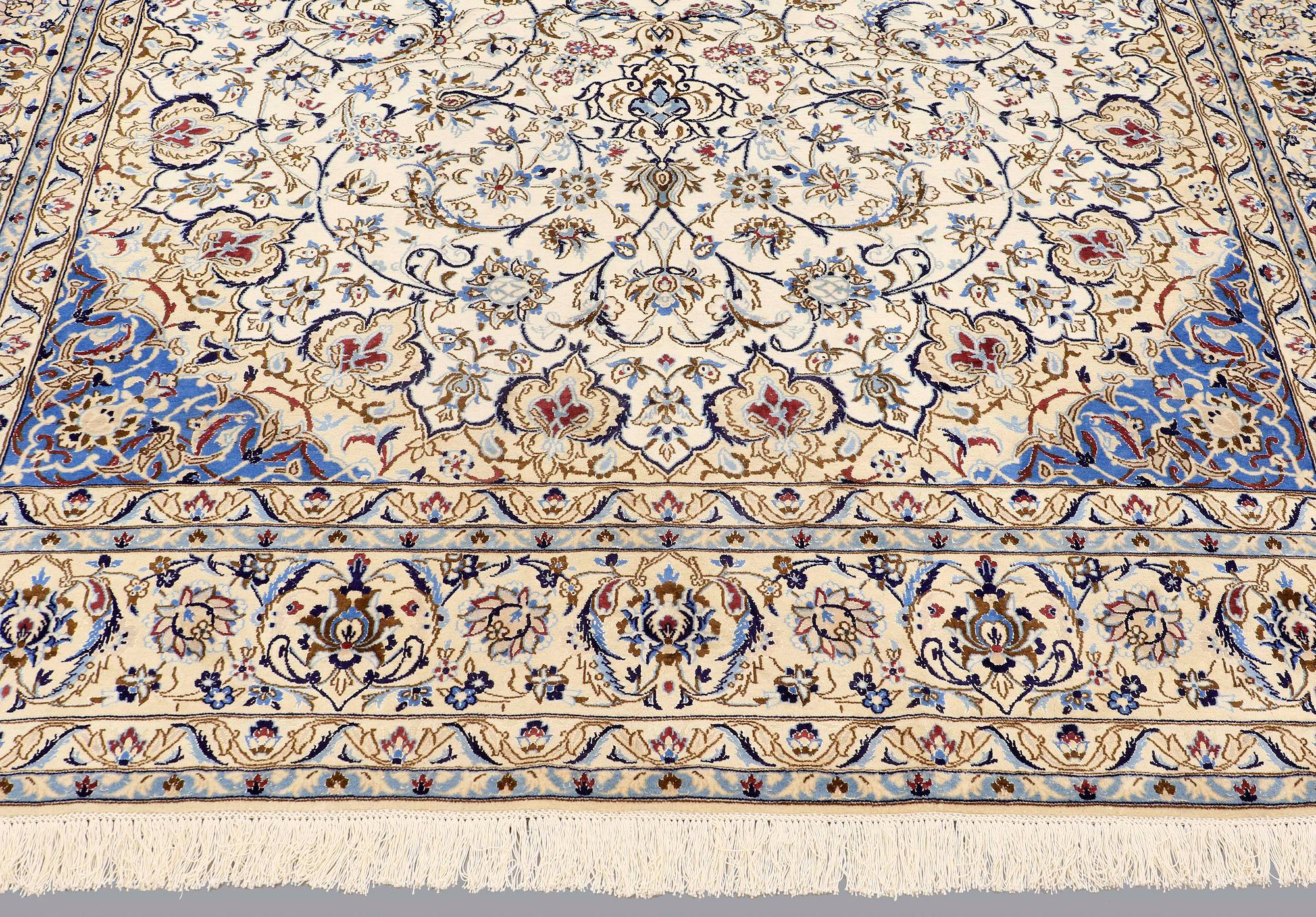 A carpet, Nain part silk, 364 x 256 cm.