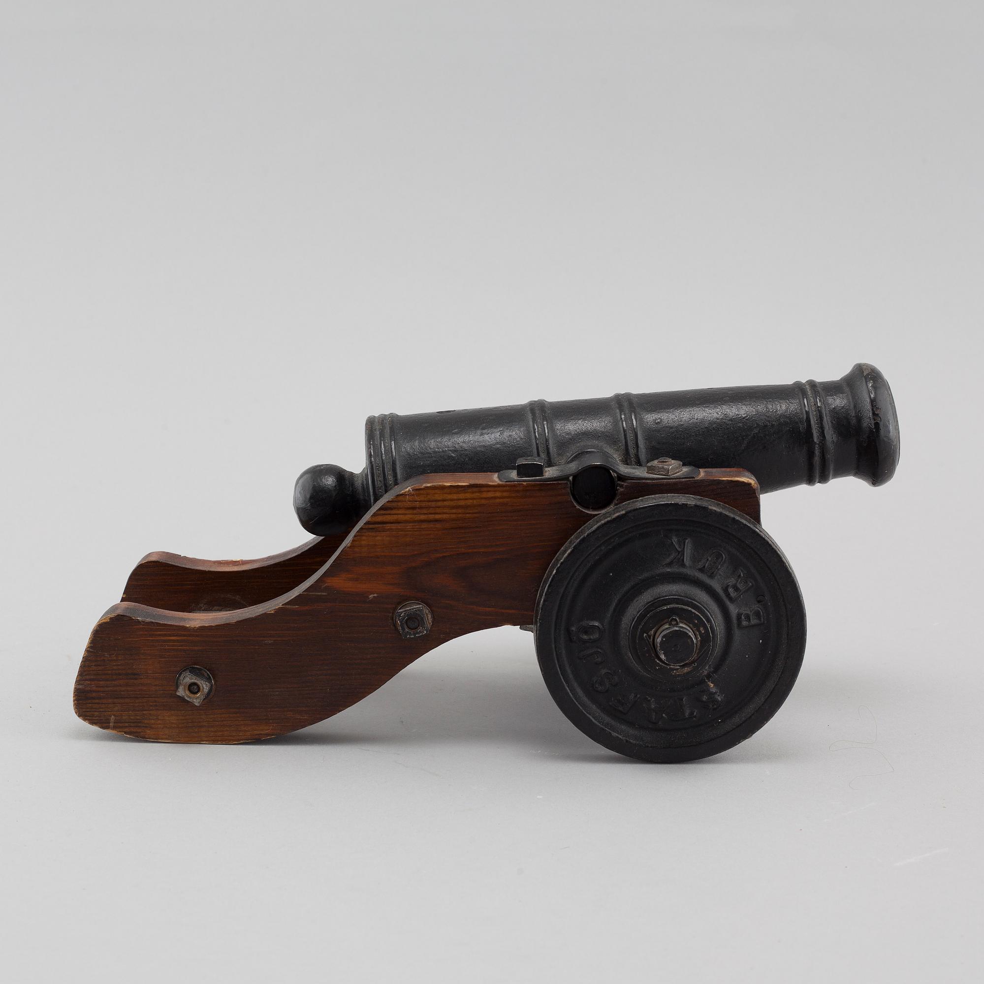 A 20th century salute cannon with wooden gun carriage by Stafsjö Bruk, Sweden.
