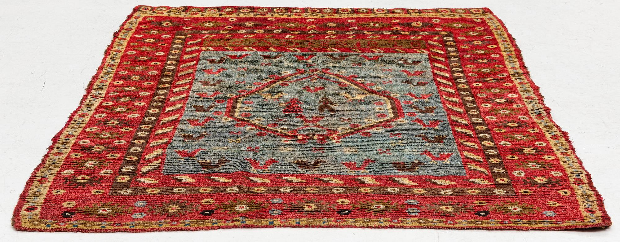 A bed cover, so called 'Bridal rya' c. 173 x 143 cm, dated 1828.