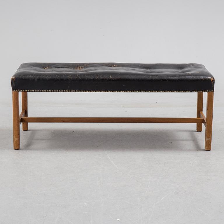 JOSEF FRANK, leather stool/bench, Firma Svenskt Tenn, model 2082.