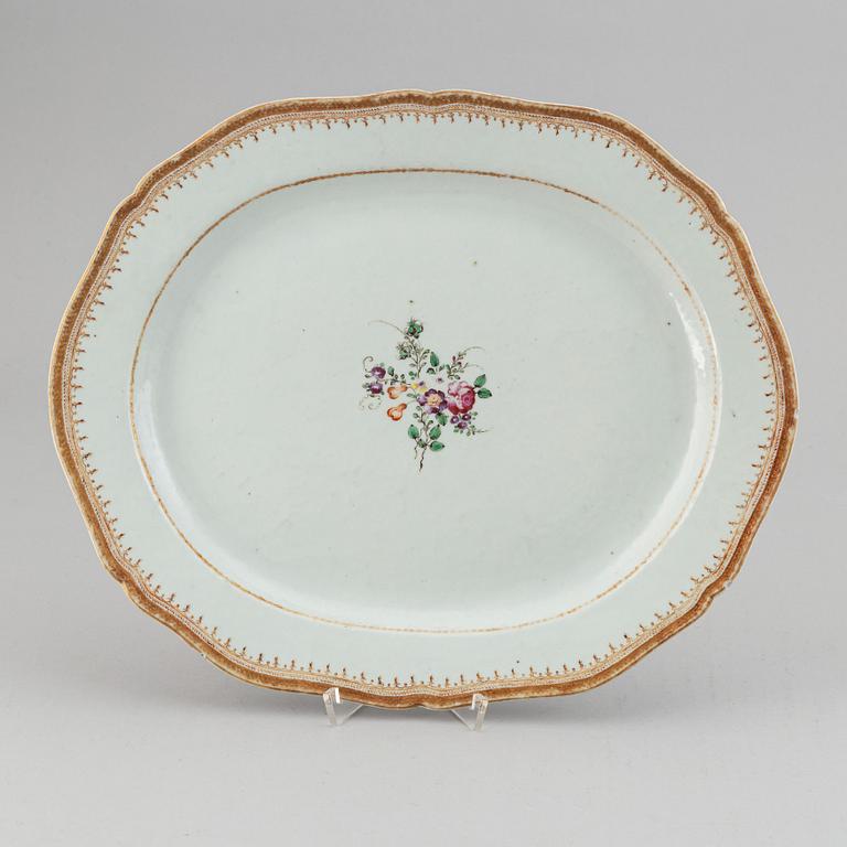 Two famille rose serving dishes and a sauce boat, Qing dynasty, Qianlong (1736-95).
