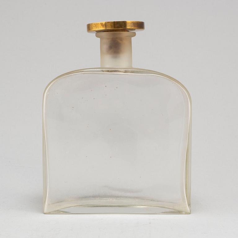 BJÖRN TRÄGÅRDH, a blasted glass bottle with a pewter and brass stopper,  Svenskt Tenn, Stockholm 1930's.