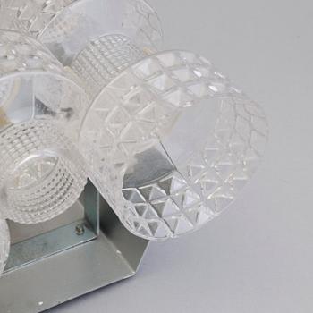 A pair of wall lamps by Gert Nyström for Fagerhult, second half of the 20th century.