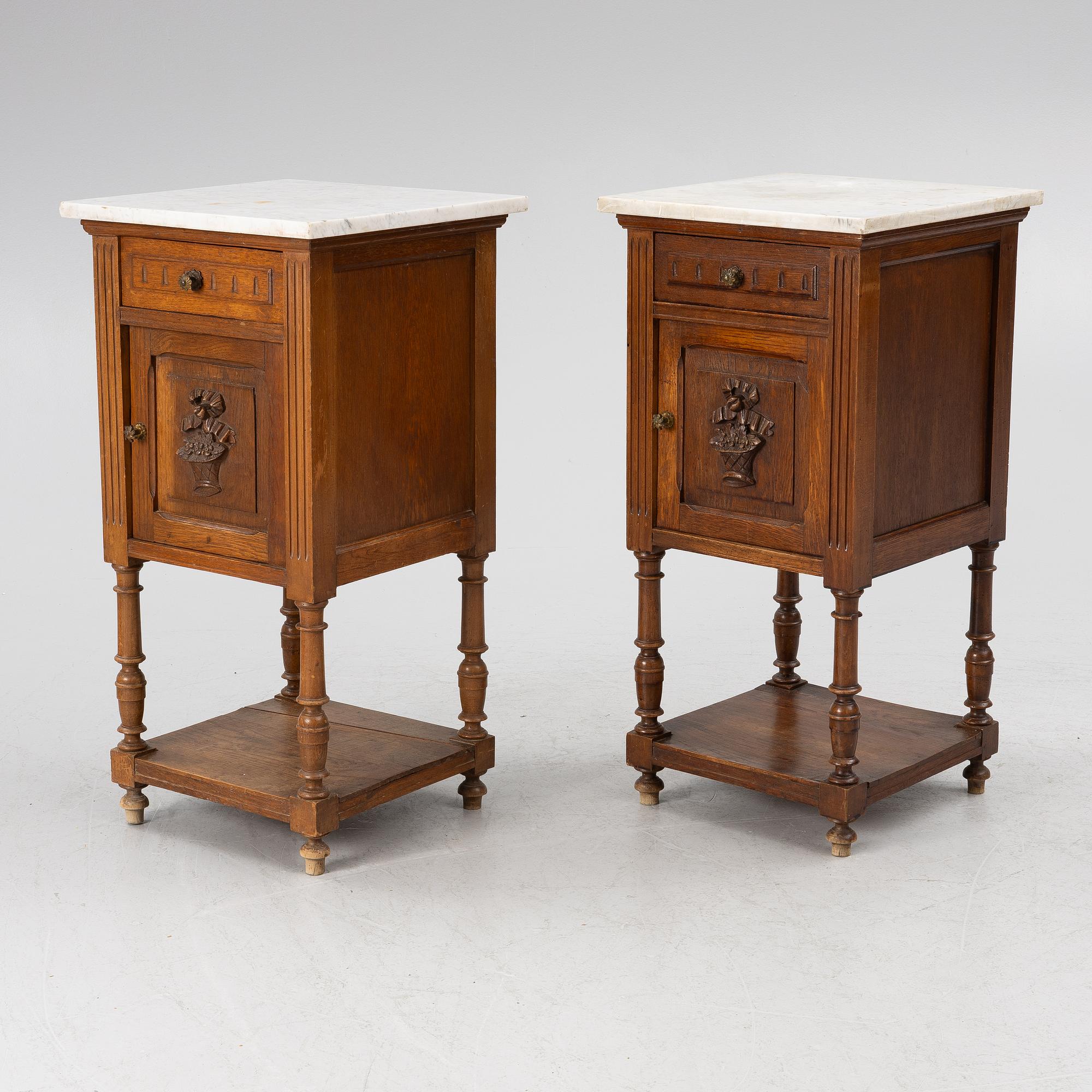 Á pair of bedside tables, circa 1900.