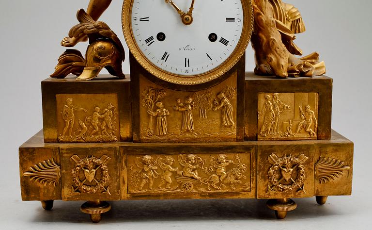 A French Empire early 19th century gilt bronze mantel clock.