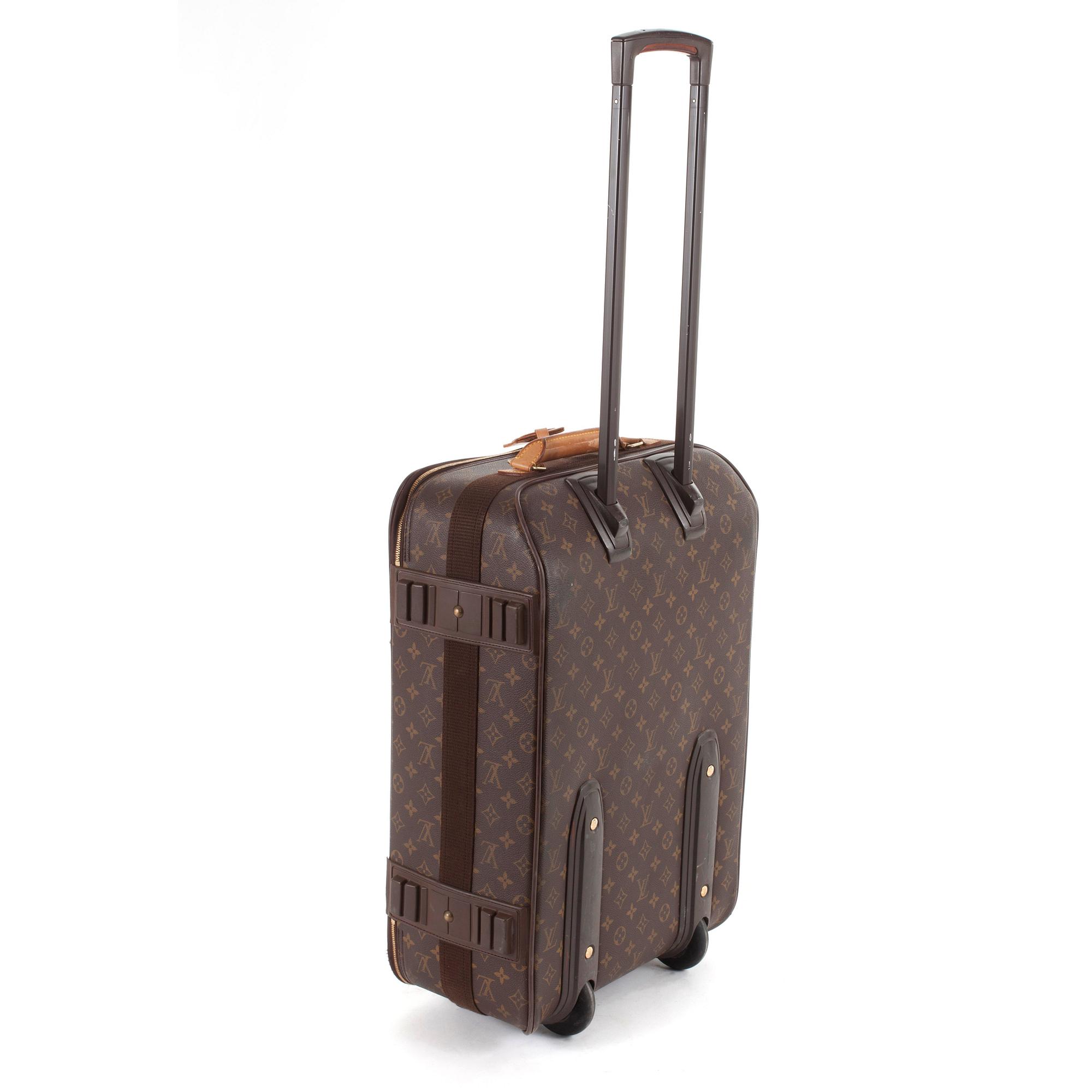 LOUIS VUITTON, a monogram canvas suitcase.