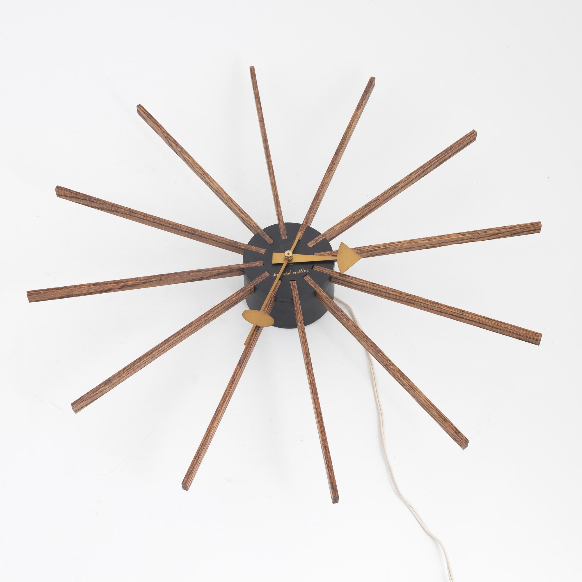 George Nelson, a 1960's spoke wall clock, model 2227, for Howard Miller. USA.