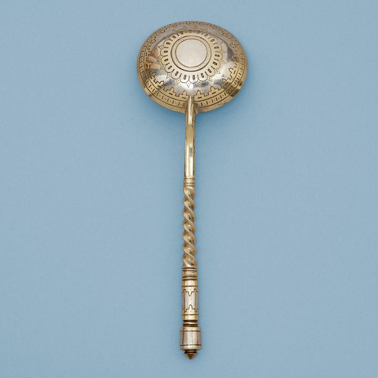 A Russian 19th century parcel-gilt caviar-spoon, marks of Samuel Z. Filander, S:t Petersburg 1877.