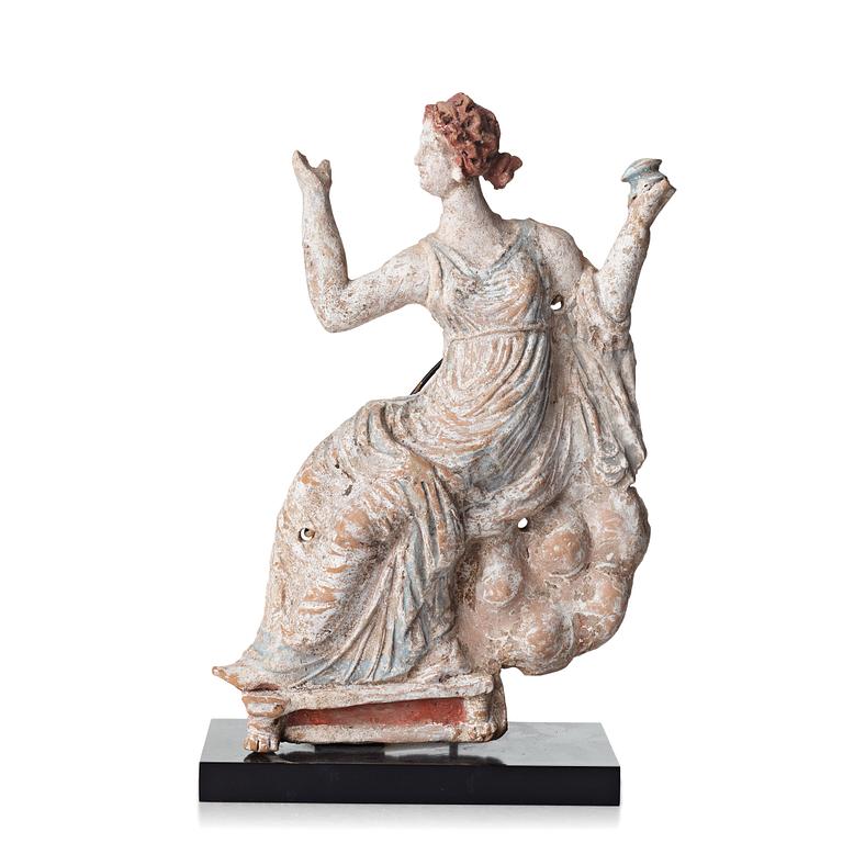 A Greek pottery sculpture of a seated lady, Hellenistic, probably circa 2nd Century B.C.