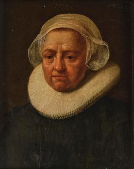 763. Rembrandt Harmensz van Rijn, follower of, Portrait of an older woman.