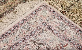 A Oriental silk carpet, 152 x 94 cm.