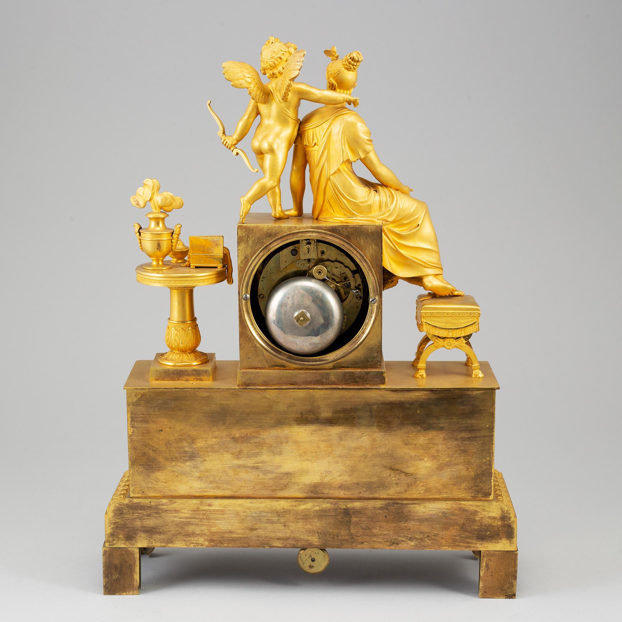 A French Empire pendulum clock, early 19th century.