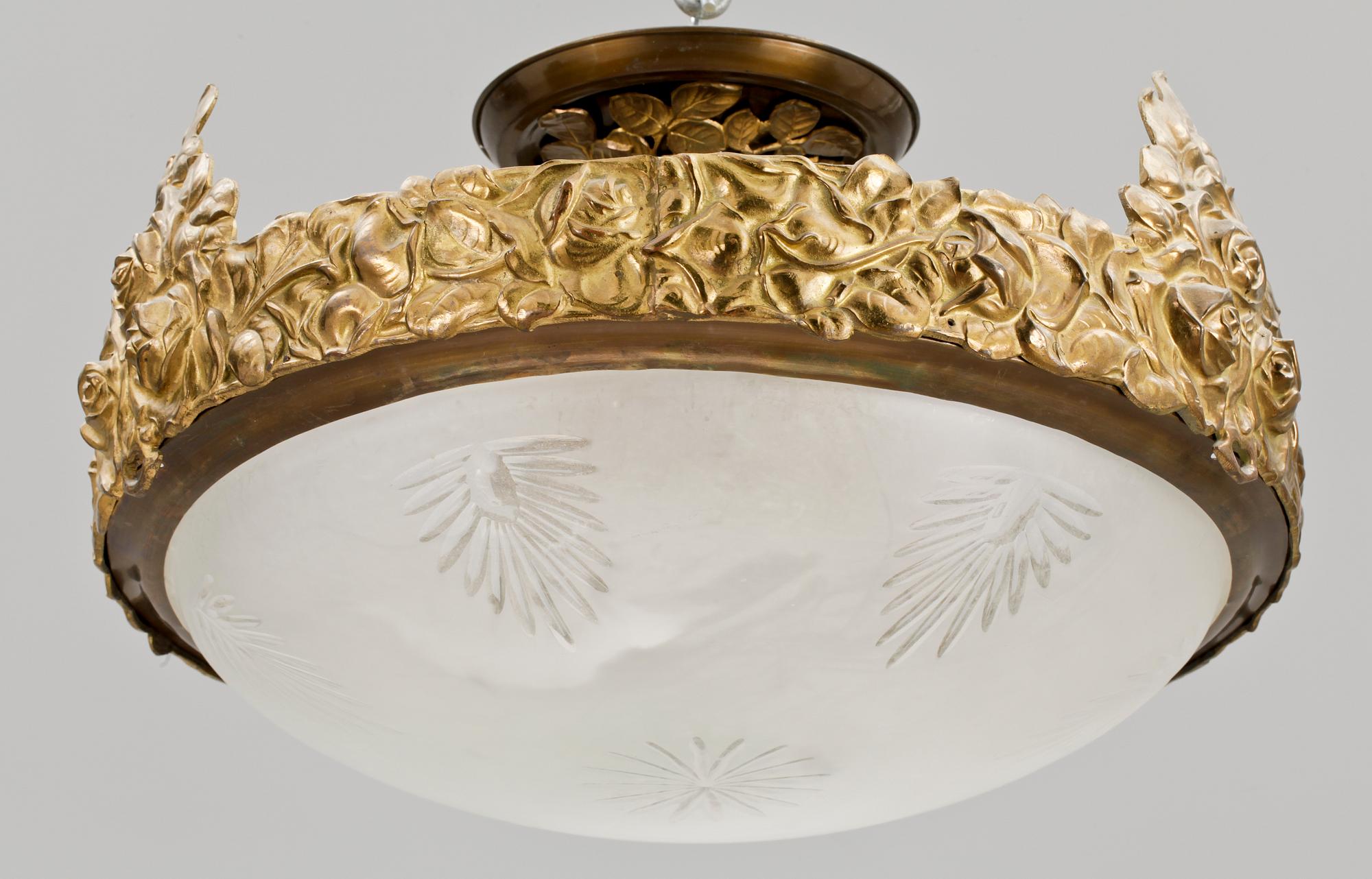 TAKLAMPA, brons, Jugend, 1900-talets början.
