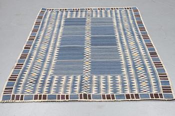 Barbro Nilsson, a carpet, "Salerno blå", flat weave, ca 245 x 177 cm, signed AB MMF BN.