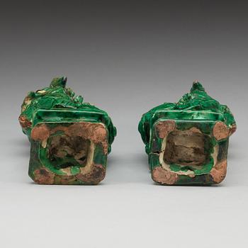 A set of two green glazed buddhistic lions, Qing dynasty.