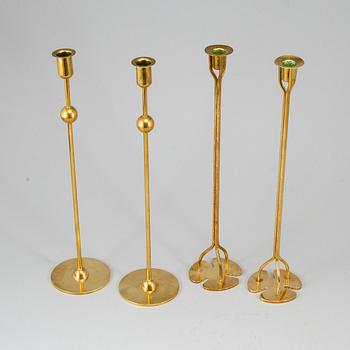 FIRMA SVENSKT TENN, 2+2 brass candlesticks. Designed by Estrid Ericson and Josef Frank.