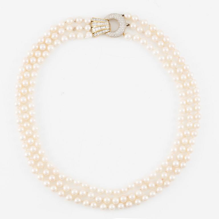 Pearl necklace, three strands of cultured pearls, clasp in gold set with baguette and brilliant-cut diamonds.
