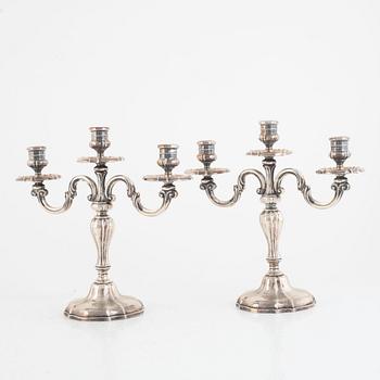 A Pair of Silver Candelabras, Swedish import mark K Anderson, Stockholm 1929.