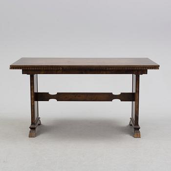 A 1920´s dinner table and six chairs probably designed by Axel Einar Hjorth for AB Svenska möbelfabriken Bodafors.
