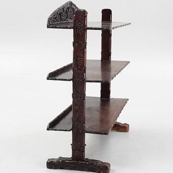 A Chinese hardwood shelf, 20th century.
