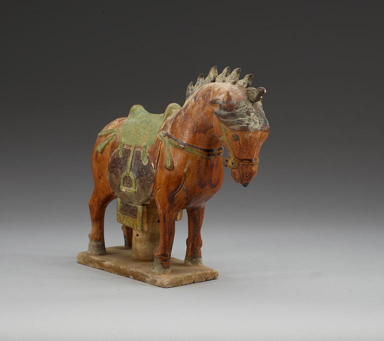 A glazed pottery figure of a horse, Ming dynasty.