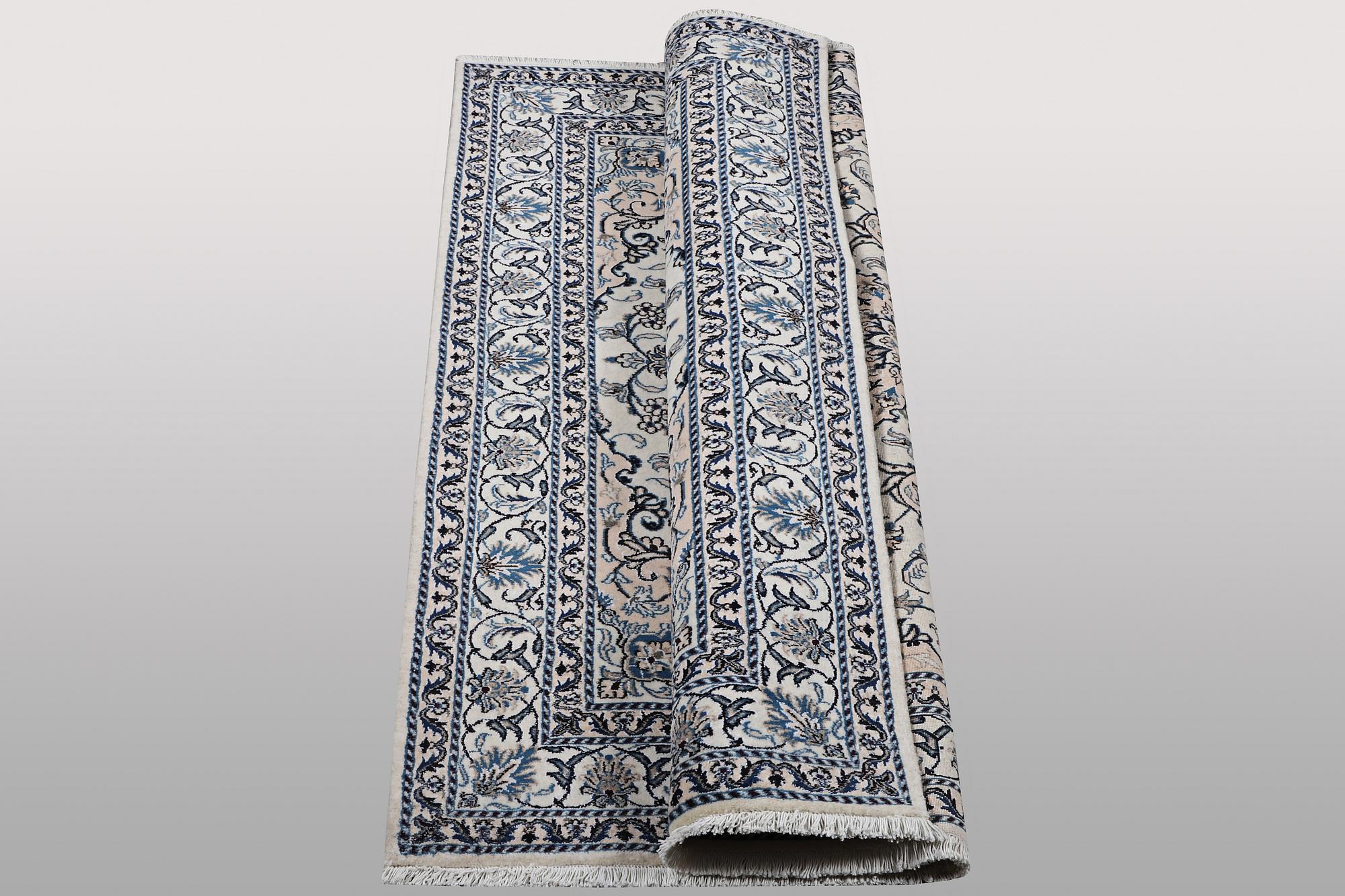 Rug, Nain, part silk, ca. 200 x 154 cm.