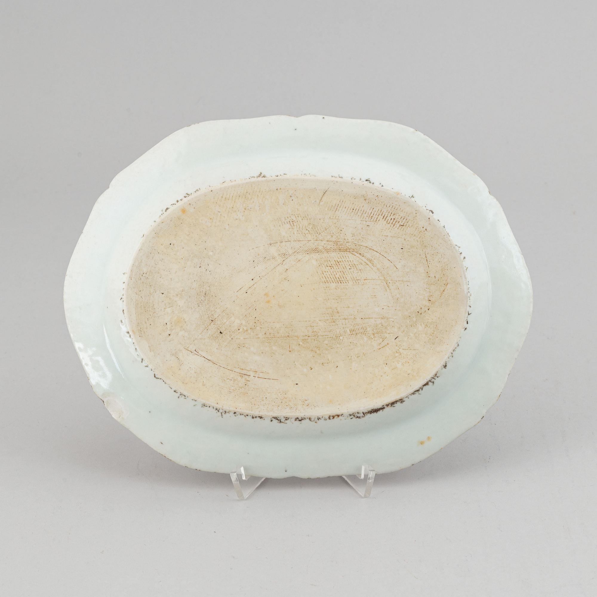 Two famille rose serving dishes and a sauce boat, Qing dynasty, Qianlong (1736-95).