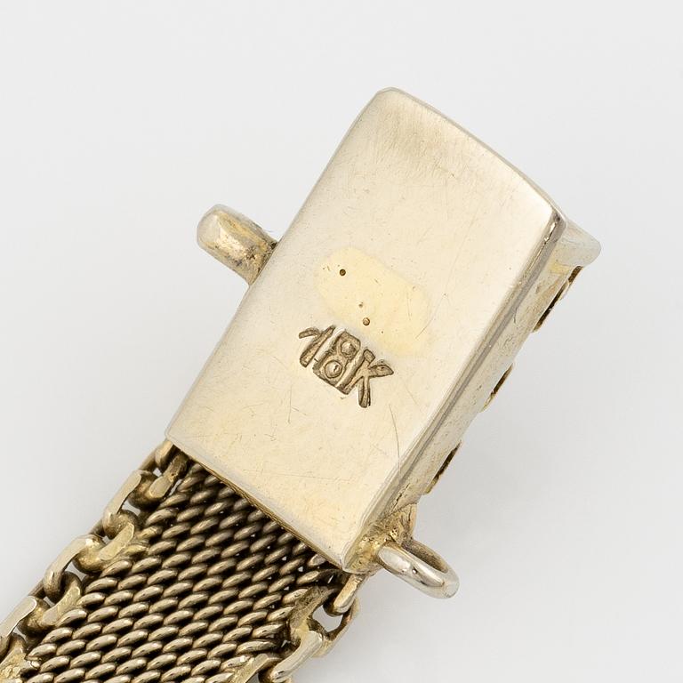 Arm bracelet, 18K white gold with brilliant-cut diamonds, old cut and octagonal-cut diamonds.