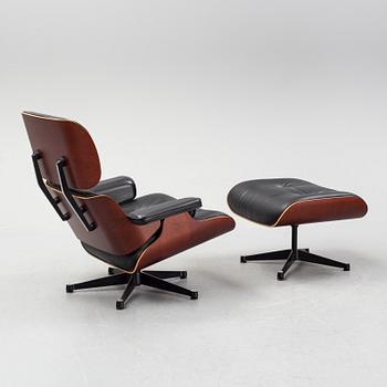 A 'Lounge chair' with stool, Charles and Ray Eames, for Vitra, 2010's.