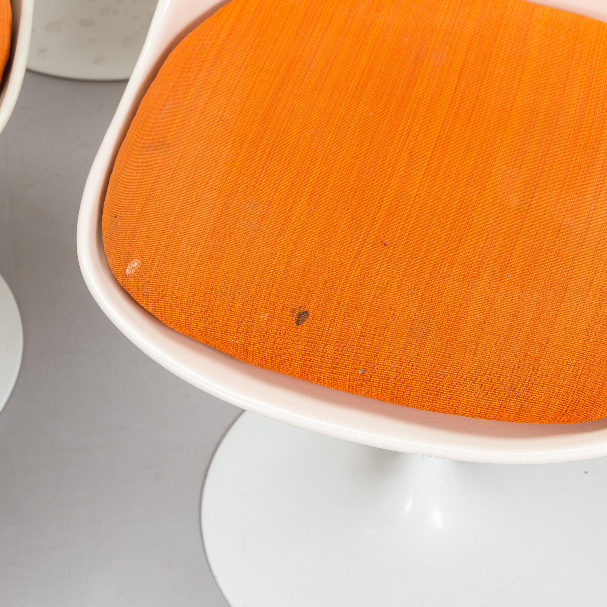 Eero Saarinen, A 'Tulip' furniture set, table with eight chairs, Knoll International, 1970s.