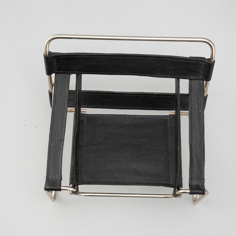 Miniatures of three famous design chairs, 21st century.