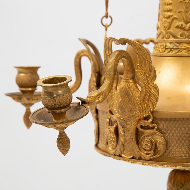 A presumably Italian Empire six-light ormolu chandelier, early 19th century.