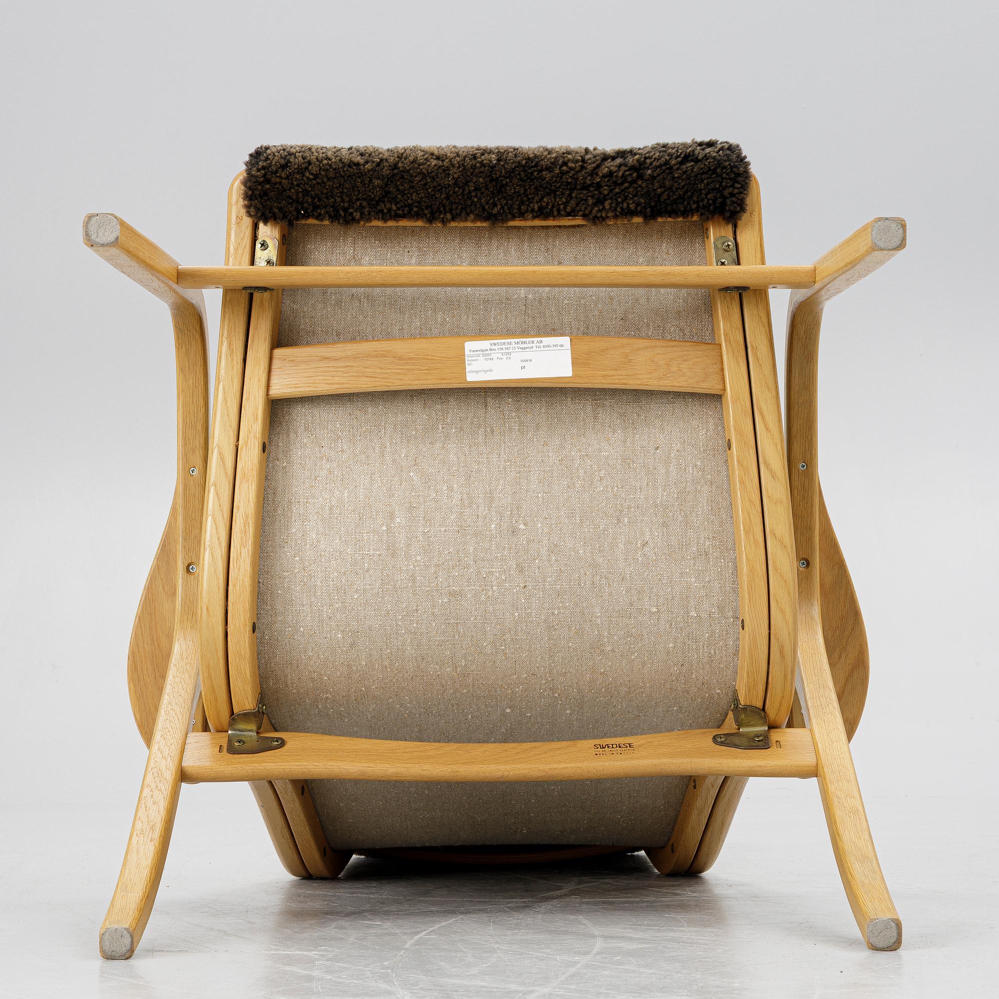 Yngve Ekström, a 'Lamino' armchair,  Swedese, 21st century.