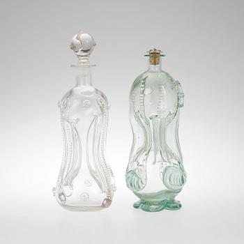 FLASKOR, 2 st, så kallade kluckaflaskor, 1900-tal.